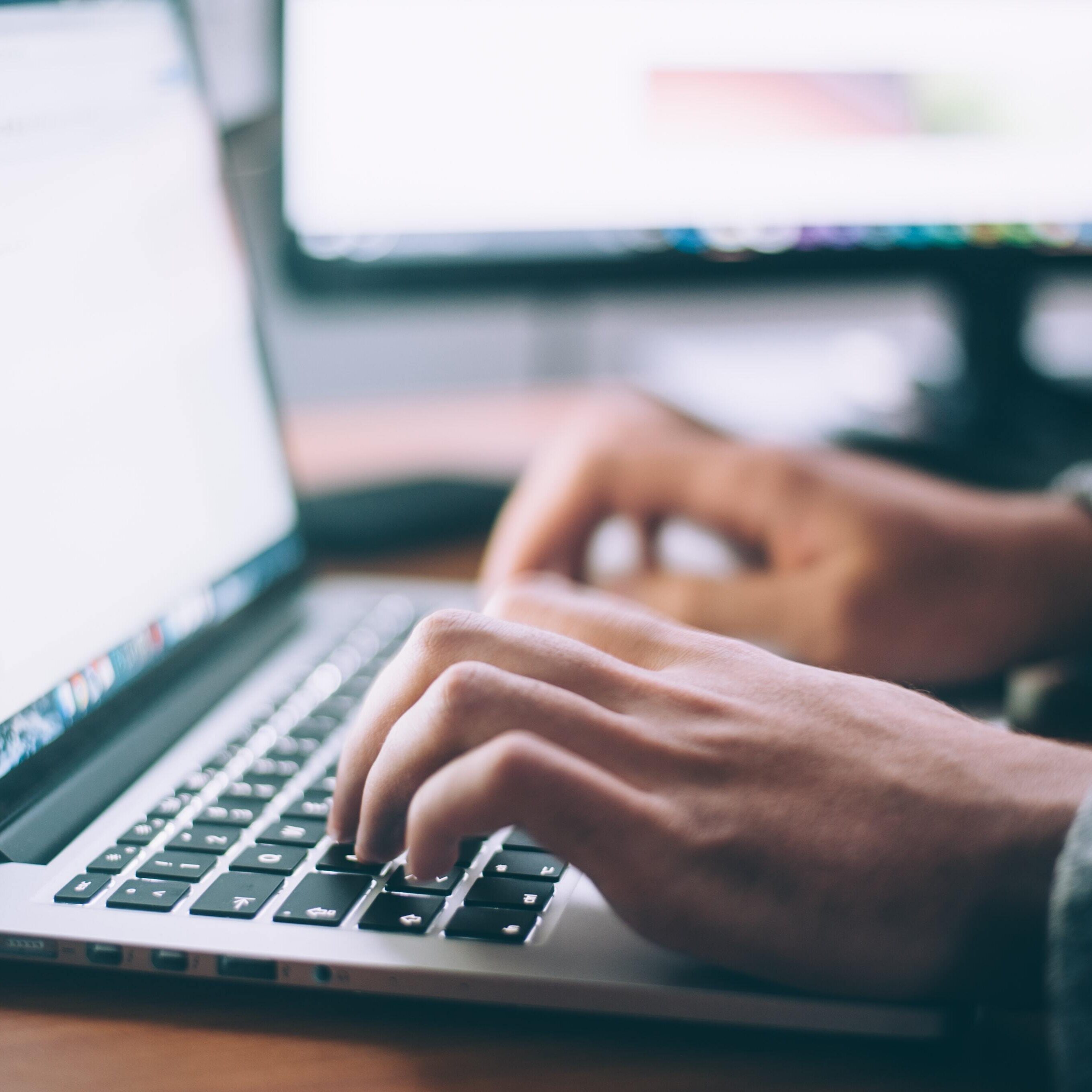 Typing on a Laptop